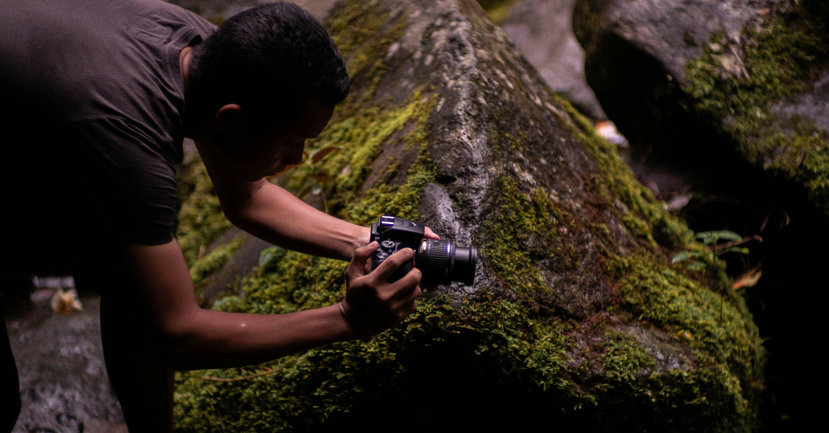 Persona con cámara de fotos